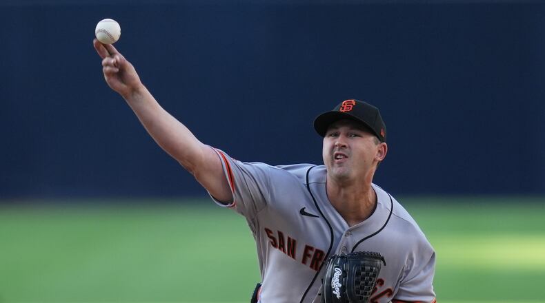 San Francisco Giants starting pitcher Tyler Mahle works against a San Diego Padres batter during the second inning of a baseball game Saturday, Aug. 1, 2026, in San Diego. (AP Photo/Gregory Bull)