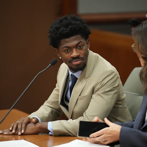 FILE - Lil Nas X, whose legal name is Montero Lamar Hill, appears in court on March 12, 2026, in Los Angeles, charged with four felony counts, including three counts of battery with injury on a police officer. (Daniel Cole/Pool Photo via AP, File)