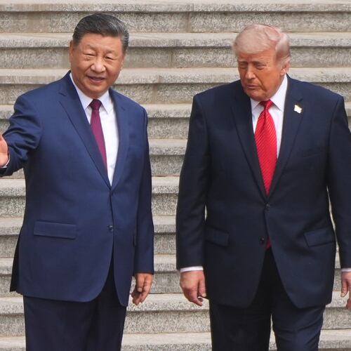 FILE - President Donald Trump participates in a welcome ceremony with China's President Xi Jinping at the Great Hall of the People, May 14, 2026, in Beijing. (AP Photo/Mark Schiefelbein, File)
