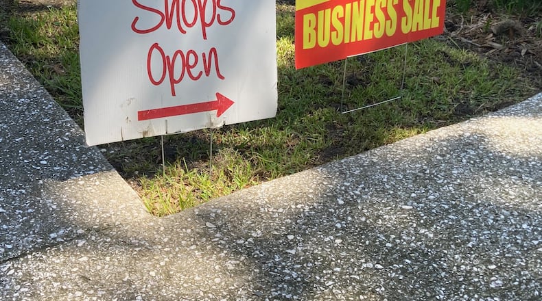 Several retail stores in Jekyll Island's historic Pier Road shopping district will close for good on Labor Day. (Adam Van Brimmer/AJC)