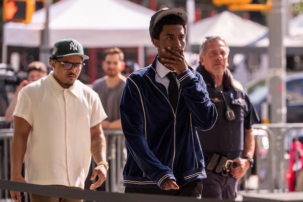 King Combs, right and Justin Dior, left, sons of Sean Combs, arrive at court on Monday, June 30, 2025, in New York. (AP Photo/Yuki Iwamura)