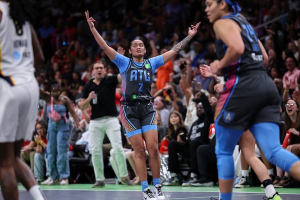 Dream guard Te-Hina Paopao celebrates after making a 3-pointer against the Indiana Fever on Thursday, May, 22, 2025, in Atlanta.  Currently, she’s averaging 6.2 points per game while holding the fourth-best percentage on made 3s this season. (Colin Hubbard/AP)