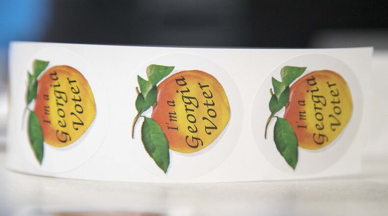 03/02/2020 — Sandy Springs, Georgia — Stickers are available for early voters during the presidential primary election at Sandy Springs library, Monday, March 2, 2020. (ALYSSA POINTER/ALYSSA.POINTER@AJC.COM)