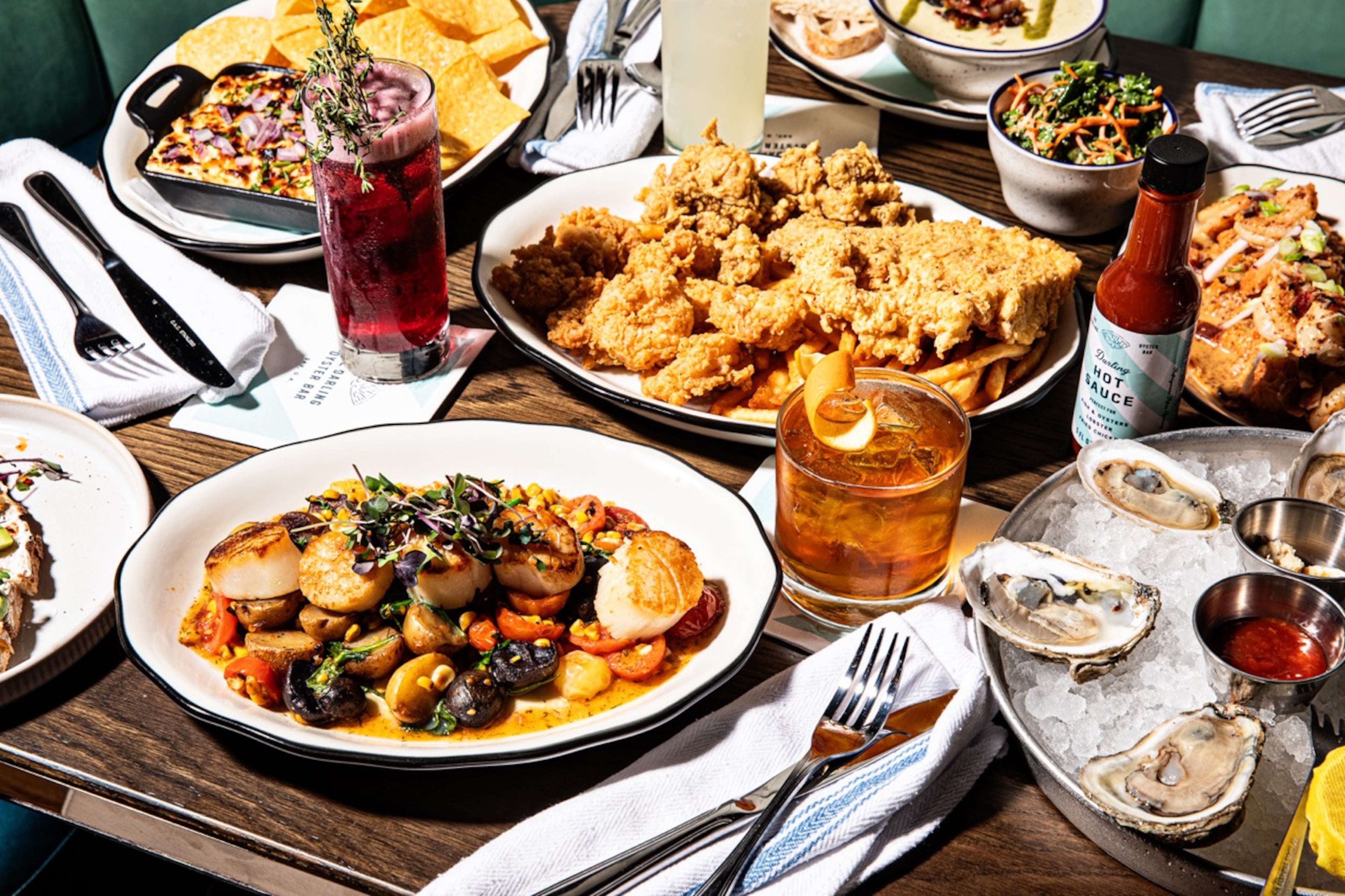 The menu at The Darling Oyster Bar features a range of raw oyster, appetizers, main dishes and sides. (Courtesy of Andrew Cebulka)