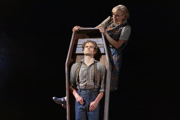 This image released by DKC/O+M shows Andrew Durand, center, with Julia Knitel, during a performance of “Dead Outlaw." (Matthew Murphy/DKC/O+M via AP)