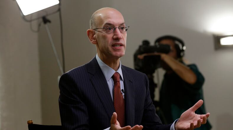 Adam Silver, commissioner of the National Basketball Association (NBA), speaks during a Bloomberg Television interview at the Bloomberg Sports Business Summit in New York, U.S., on Thursday, Sept. 4, 2014. Silver said legalized sports gambling in the U.S. is likely to spread and the National Basketball Association expects to profit from it. Photographer: Peter Foley/Bloomberg *** Local Caption *** Adam Silver NBA commissioner Adam Silver mandated Donald Sterling's exit over racist comments. (Peter Foley/Bloomberg)
