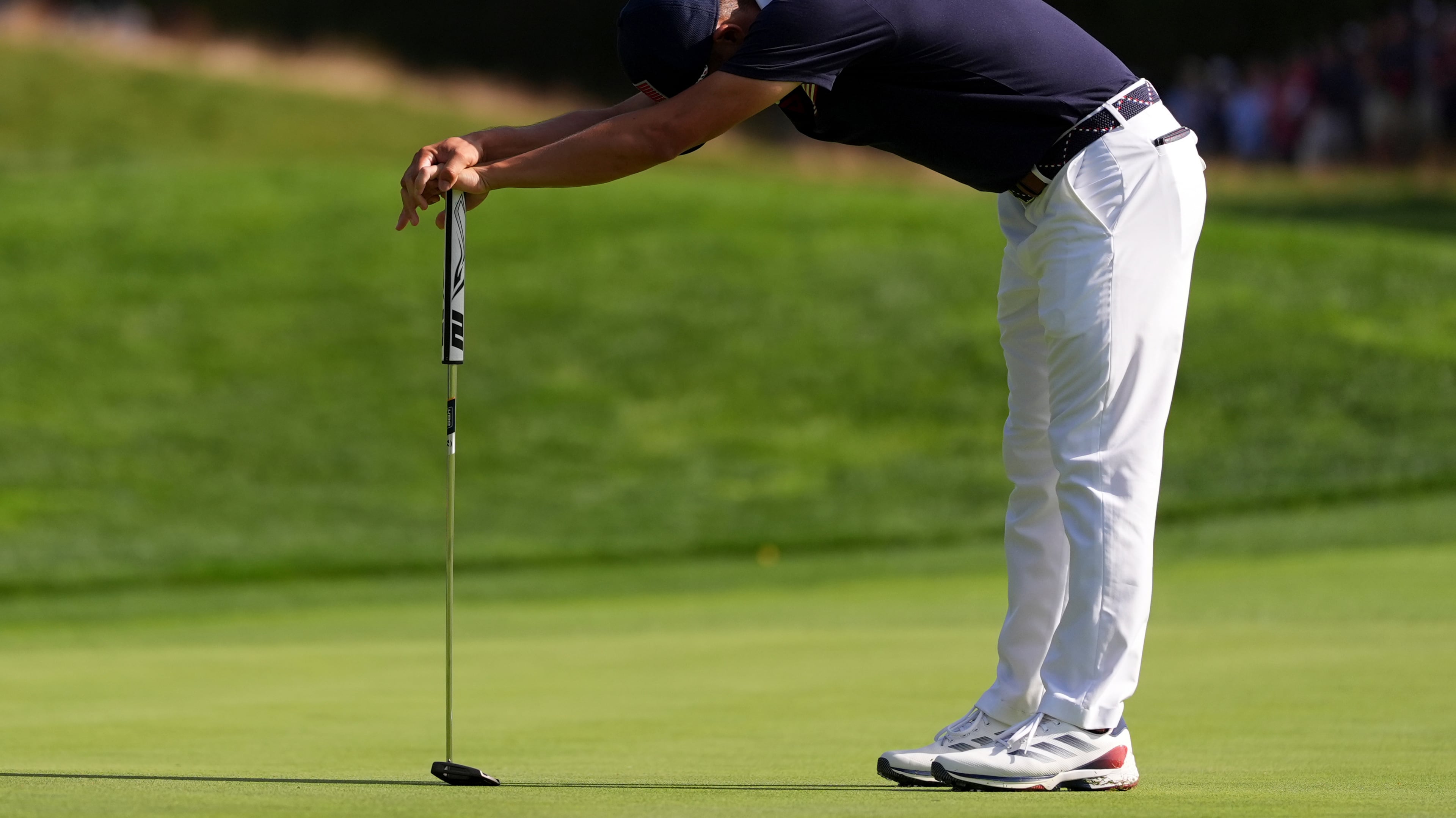 United States' Collin Morikawa reacts after missing a putt on the 13th hole at Bethpage Black golf course during the Ryder Cup golf tournament, Saturday, Sept. 27, 2025, in Farmingdale, N.Y. (AP Photo/Lindsey Wasson)
