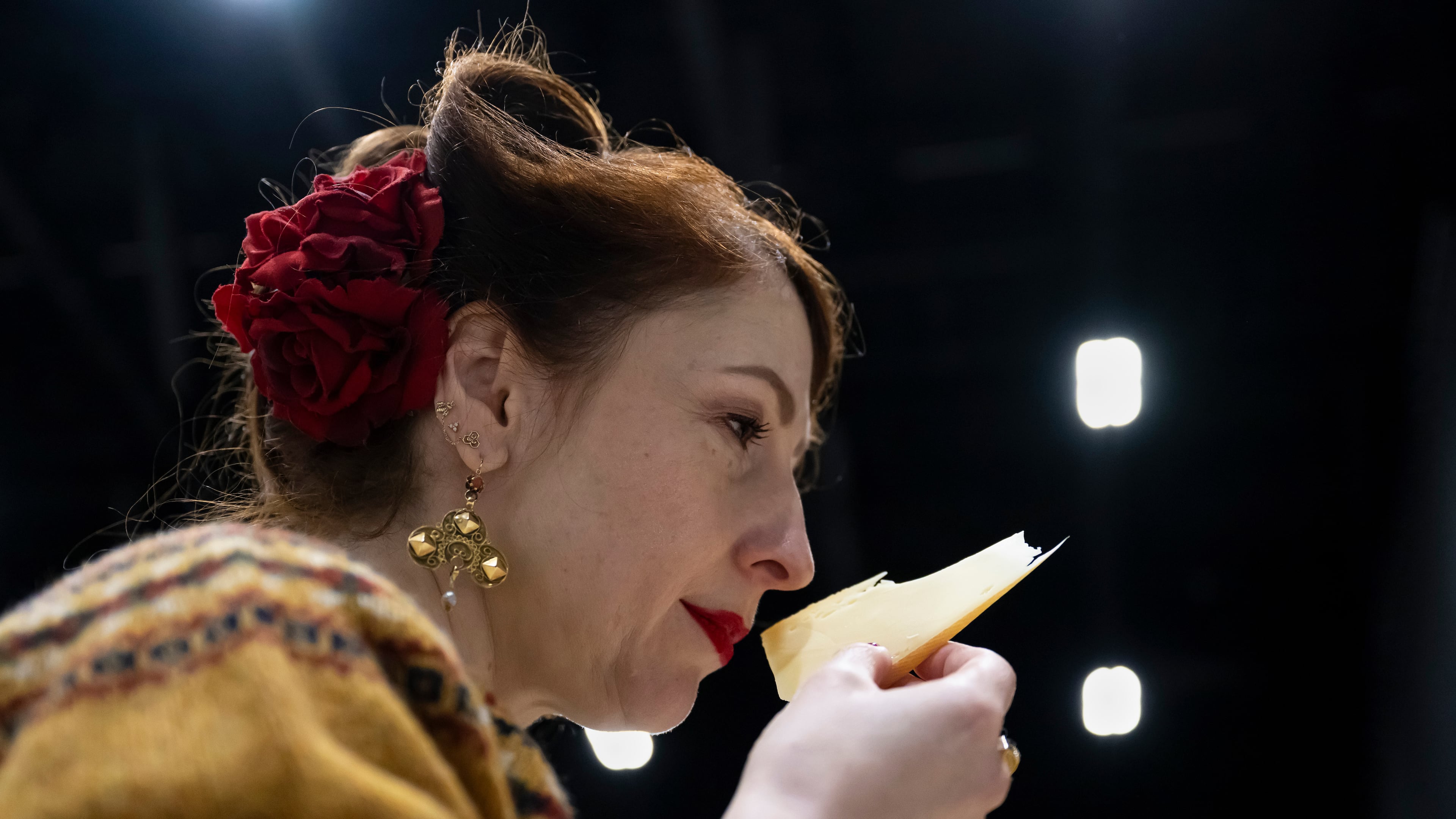 A Member of the jury analyzes and tastes cheeses from different countries, during the 37th World Cheese Awards, at the Festhalle in Bern, Switzerland, Thursday, Nov. 13, 2025. (Anthony Anex/Keystone via AP)