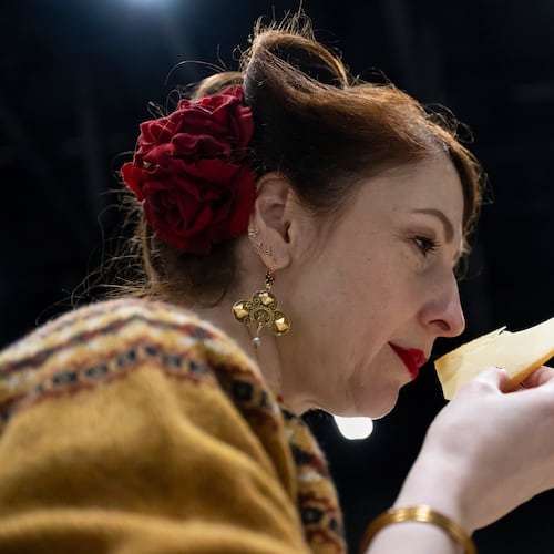 A Member of the jury analyzes and tastes cheeses from different countries, during the 37th World Cheese Awards, at the Festhalle in Bern, Switzerland, Thursday, Nov. 13, 2025. (Anthony Anex/Keystone via AP)