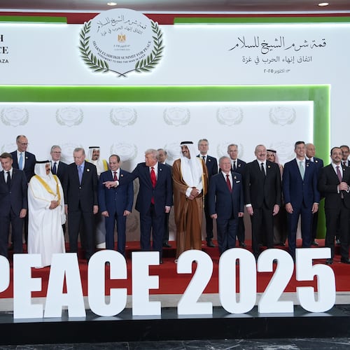 President Donald Trump and other leaders gather for a family photo during a summit to support ending the more than two-year Israel-Hamas war in Gaza after a breakthrough ceasefire deal, Monday, Oct. 13, 2025, in Sharm El Sheikh, Egypt. (AP Photo/Evan Vucci, Pool)