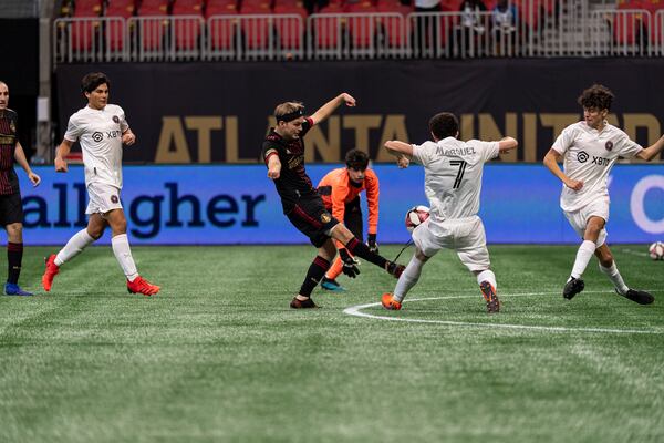 Brendan Jagielski kicks the soccer ball in Images from the Atlanta United Unified team match against the Inter Miami Unified team at Mercedes-Benz Stadium in October. (Photo by Mitchell Martin /Atlanta United)
