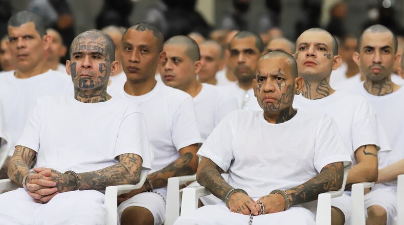 FILE - Alleged gang members take part in a mass trial at the Terrorism Confinement Center (CECOT) in Tecoluca, El Salvador, April 23, 2026. (AP Photo/Salvador Melendez, File)