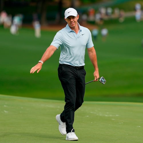 Rory McIlroy, of Northern Ireland, follows his shot on the 15th green during second round of the Truist Championship golf tournament at the Quail Hollow Club, Friday, May 8, 2026, in Charlotte, N.C. (AP Photo/Chris Carlson)