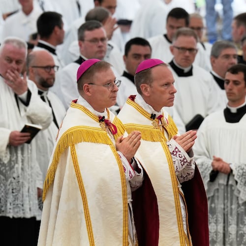 Father Pascal Schreiber, left, and father Michael Goldade arrive for their consecration ceremony as bishops in a tent set up outside the Society of St. Pius X seminary, in Econe, Switzerland, Wednesday, July 1, 2026. (AP Photo/Baz Ratner)