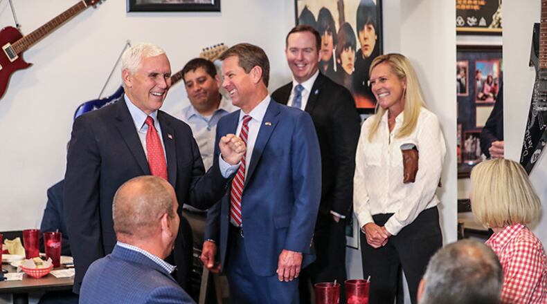 Vice President Mike Pence (left), Gov. Brian Kemp (center) and  first lady Marty Kemp at the Star Cafe in Atlanta on Friday, May 22, 2020. (Photo: JOHN SPINK/JSPINK@AJC.COM)