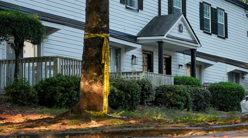 The Nissan Golden Gate apartment complex in DeKalb County was the scene of a Sunday night shooting that left two children dead and two women injured. On Tuesday, police announced they had made an arrest. (Ben Hendren for the AJC)