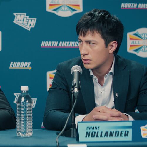 This image released by HBO Max shows Connor Storrie, left, and Hudson Williams in a scene from the series "Heated Rivalry." (HBO Max via AP)