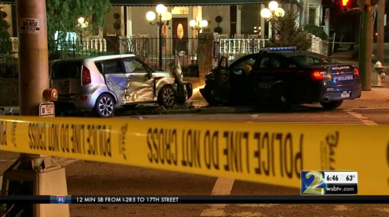 State troopers are investigating after an Atlanta police officer crashed into another driver while she was responding to a 911 call.