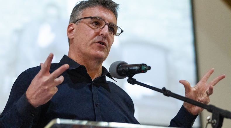 Cameron McWhirter, Wall Street Journal reporter and author of “Red Summer,” speaks to the crowd during the Jubilee Day celebration Wednesday, January 1, 2020, at Rainbow Park Baptist Church in Decatur. STEVE SCHAEFER / SPECIAL TO THE AJC