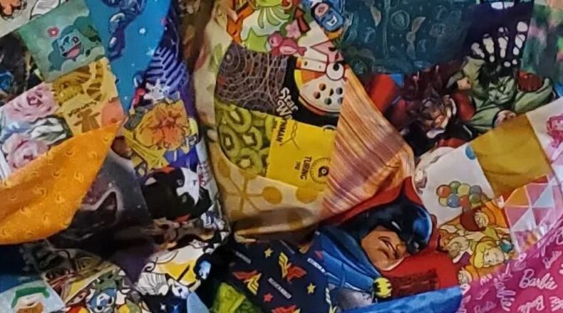 Melissa J. Walter Feuer makes her Dragon Con quilts from scraps of fabric sent to her from costumers and creators. (Photo provided by Melissa J. Walter Feuer)