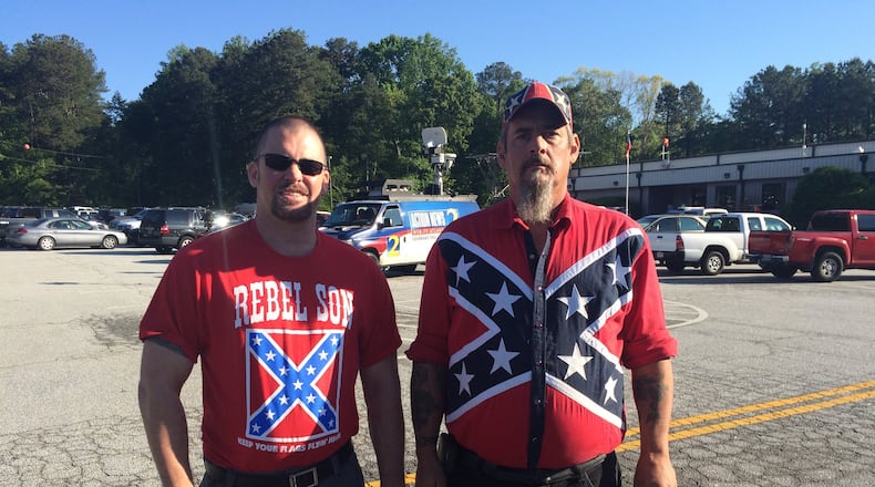 Georgia activists John Michael Estes (left) and Greg Calhoun (right), organizers of the “white power” demonstration “Rock Stone Mountain,” pose prior to an April 2016 rally. Estes and other organizers have called off a similar rally scheduled for Saturday at Stone Mountain Park during Super Bowl weekend.