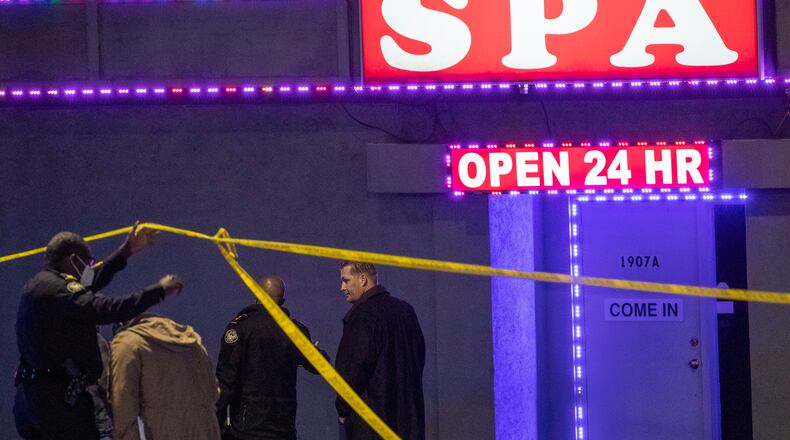 Atlanta police officers and detectives respond to a crime scene at Aromatherapy Spa and Gold Spa, both located in the 1900 block of Piedmont Road NE in Atlanta, Tuesday, March 16, 2021. (Alyssa Pointer/Atlanta Journal-Constitution/TNS)