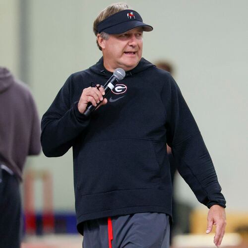 Georgia coach Kirby Smart — pictured giving instructions during practice Wednesday, Aug. 5, 2026 — said of the recent ruling allowing players from the 2022 signing class who have completed four years of eligibility to return for a fifth season: “So, if somebody knew what was coming, kind of like a crystal ball, and they said, ‘We’re gonna sit at 100 so we can bring five guys in,’ they were a lot smarter than me." (Miguel Martinez/AJC)