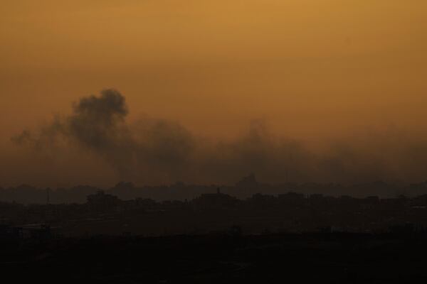 Smoke from Israeli bombardment rises from the Gaza Strip as seen from southern Israel, Tuesday, March 25, 2025. (AP Photo/Maya Alleruzzo)