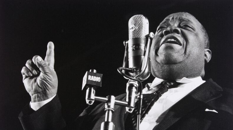 Jazz singer Jimmy Rushing, who bridged the big band and modern era, appears in performance with the Duke Ellington orchestra in this photo from 1960. Photo: Herb Snitzer