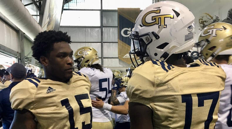 Georgia Tech linebacker Jerry Howard (15) talks with linebacker Demetrius Knight (17) during a break in practice March 7, 2020 at the Brock Football Practice Facility. (AJC photo by Ken Sugiura)