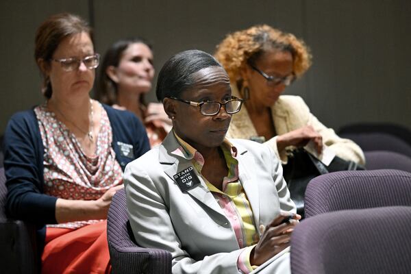 Inspector General Shannon Manigault sits among other attendees during the first meeting of a task force established to review the inspector general's authority at Atlanta City Hall, Tuesday, September 24, 2024, in Atlanta. The task force established to review the procedures of the Office of the Inspector General and Ethics Office met for the first time Tuesday. (Hyosub Shin / AJC)