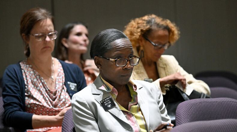 Inspector General Shannon Manigault sits among other attendees during the first meeting of a task force established to review the inspector general's authority at Atlanta City Hall, Tuesday, September 24, 2024, in Atlanta. The task force established to review the procedures of the Office of the Inspector General and Ethics Office met for the first time Tuesday. (Hyosub Shin / AJC)