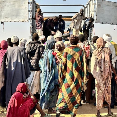 This photo released by The Norwegian Refugee Council (NRC) shows displaced families from el-Fasher at a displacement camp where they sought refuge from fighting between government forces and the RSF, in Tawila, Darfur region, Sudan, Friday, October. 31, 2025. (NRC via AP)