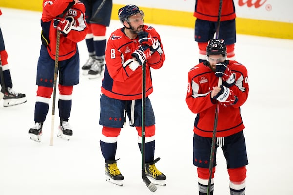 Washington Capitals left wing Alex Ovechkin (8) looks on after Game 5 of a second-round NHL hockey playoff series against the Carolina Hurricanes Thursday, May 15, 2025, in Washington. (AP Photo/Nick Wass)