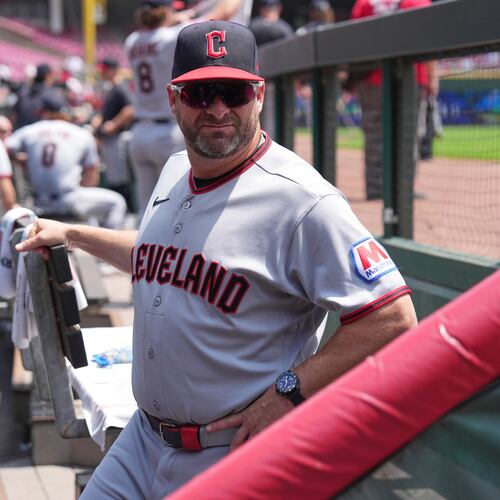 Cleveland Guardians manager Stephen Vogt stands in the dugout before the first baseball game of a doubleheader against the Cincinnati Reds, Tuesday, July 28, 2026, in Cincinnati. (AP Photo/Kareem Elgazzar)