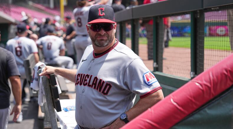 Cleveland Guardians manager Stephen Vogt stands in the dugout before the first baseball game of a doubleheader against the Cincinnati Reds, Tuesday, July 28, 2026, in Cincinnati. (AP Photo/Kareem Elgazzar)