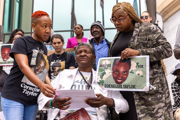 Lolita Griffeth, Cornelius Taylor’s fiance, speaks during a rally for Taylor in front of City Hall in Atlanta on Monday, October 6, 2025. Taylor was killed by the City of Atlanta during a sweep of an encampment of unhoused residents earlier this year. (Arvin Temkar/AJC)