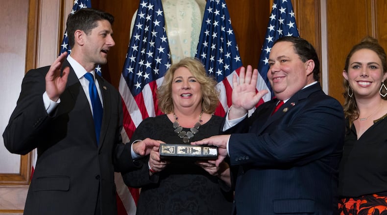 In this Jan. 3, 2017, file photo, House Speaker Paul Ryan of Wis. administers the House oath of office to Rep. Blake Farenthold, R-Texas, during a mock swearing in ceremony on Capitol Hill in Washington. The House Ethics Committee said Dec. 7 it is expanding its investigation into sexual harassment allegations against Farenthold. The committee said it will investigate whether Farenthold sexually harassed a former member of his staff and retaliated against her for complaining. The committee also said the panel would review allegations that Farenthold made inappropriate statements to other members of his official staff. ( AP Photo/Jose Luis Magana, File)