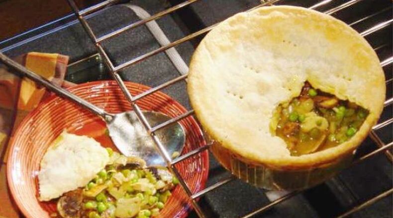 Curry powder added to the sauce gives this chicken pot pie an intriguing flavor. (Linda Gassenheimer/TNS)