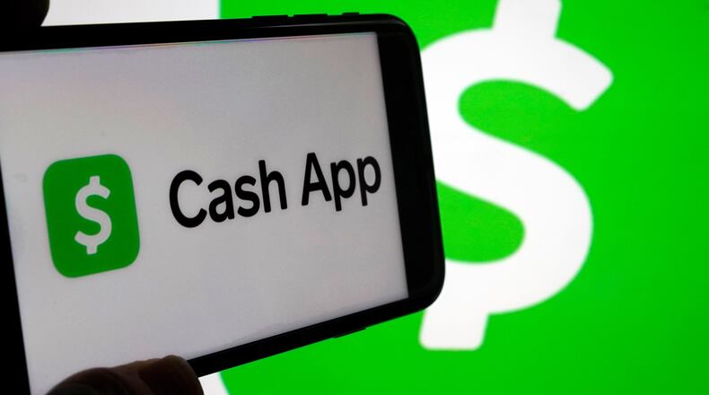 FILE - Cash App logos are seen on a phone screen, Sept. 8, 2023, in New York. (AP Photo/Richard Drew, File)