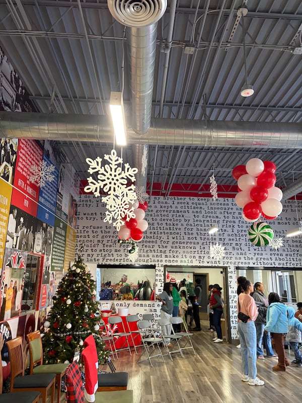 Hosea Helps’ yearly Children’s Christmas Party brought Atlanta families and their children together to disperse hot meals, free clothes, toys and other supplies on Saturday, Dec. 20. 2025. (Morayo Ogunbayo/AJC)