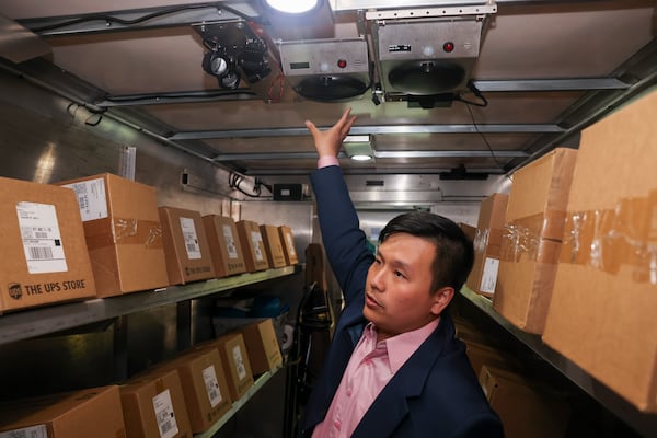 UPS RFID Deployment Manager Dat La points out a RFID scanner now installed in all U.S. package trucks at UPS headquarters, Thursday, April 16, 2026, in Atlanta. (Jason Getz/AJC)