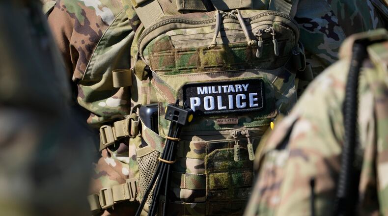 FILE - Members from the National Guard working as part of the Memphis Safe Task Force conduct a community safety patrol at Tom Lee Park, Oct. 12, 2025, in Memphis, Tenn. (AP Photo/George Walker IV, File)