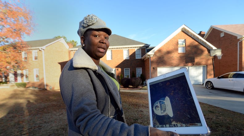 Rosemarie Thompson recently received a water bill for more than $1,500. She’s one of many people in DeKalb County facing inexplicable charges. She is shown at her Stone Mountain home Dec. 2. About 1 in 8 DeKalb water customers’ bills have tripled at least once since April 1, 2015. KENT D. JOHNSON/ AJC