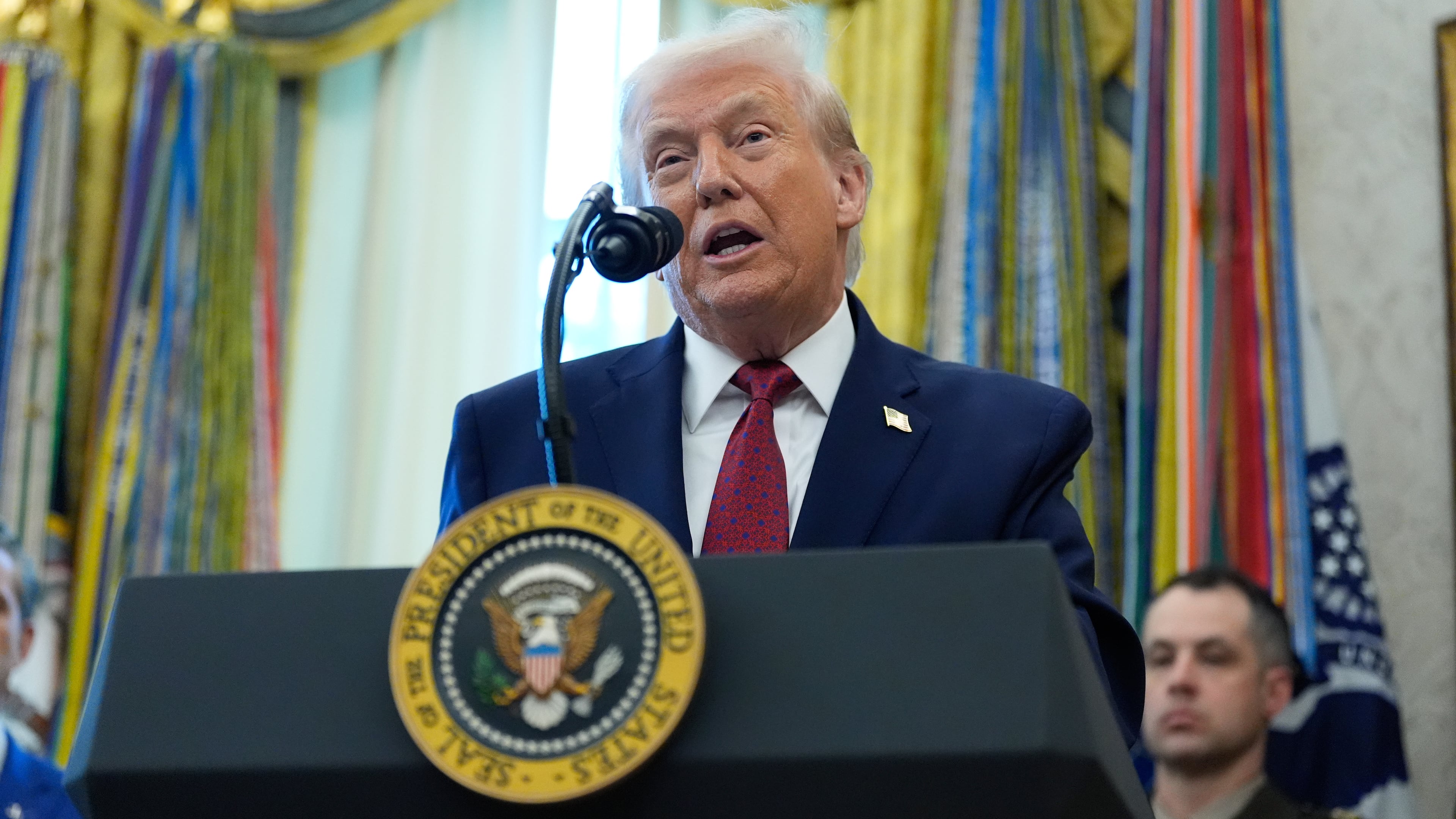 President Donald Trump speaks during a Mexican Border Defense Medal presentation in the Oval Office of the White House, Monday, Dec. 15, 2025, in Washington. (AP Photo/Alex Brandon)