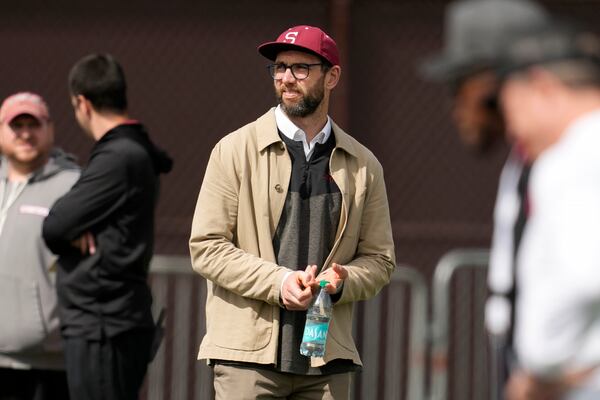 Stanford football General Manager Andrew Luck watches players participate during Stanford football Pro Day event in Stanford, Calif., Wednesday, March 19, 2025. (AP Photo/Jeff Chiu)
