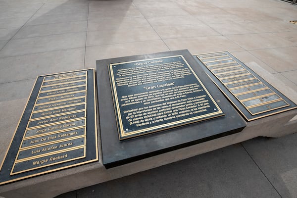 The plaque of the "Grand Candela", a memorial to honor the victims of the 2019 Walmart mass shooting, showing their names is pictured on Tuesday, March 25, 2025, in El Paso, Texas. (AP Photo/Andres Leighton)