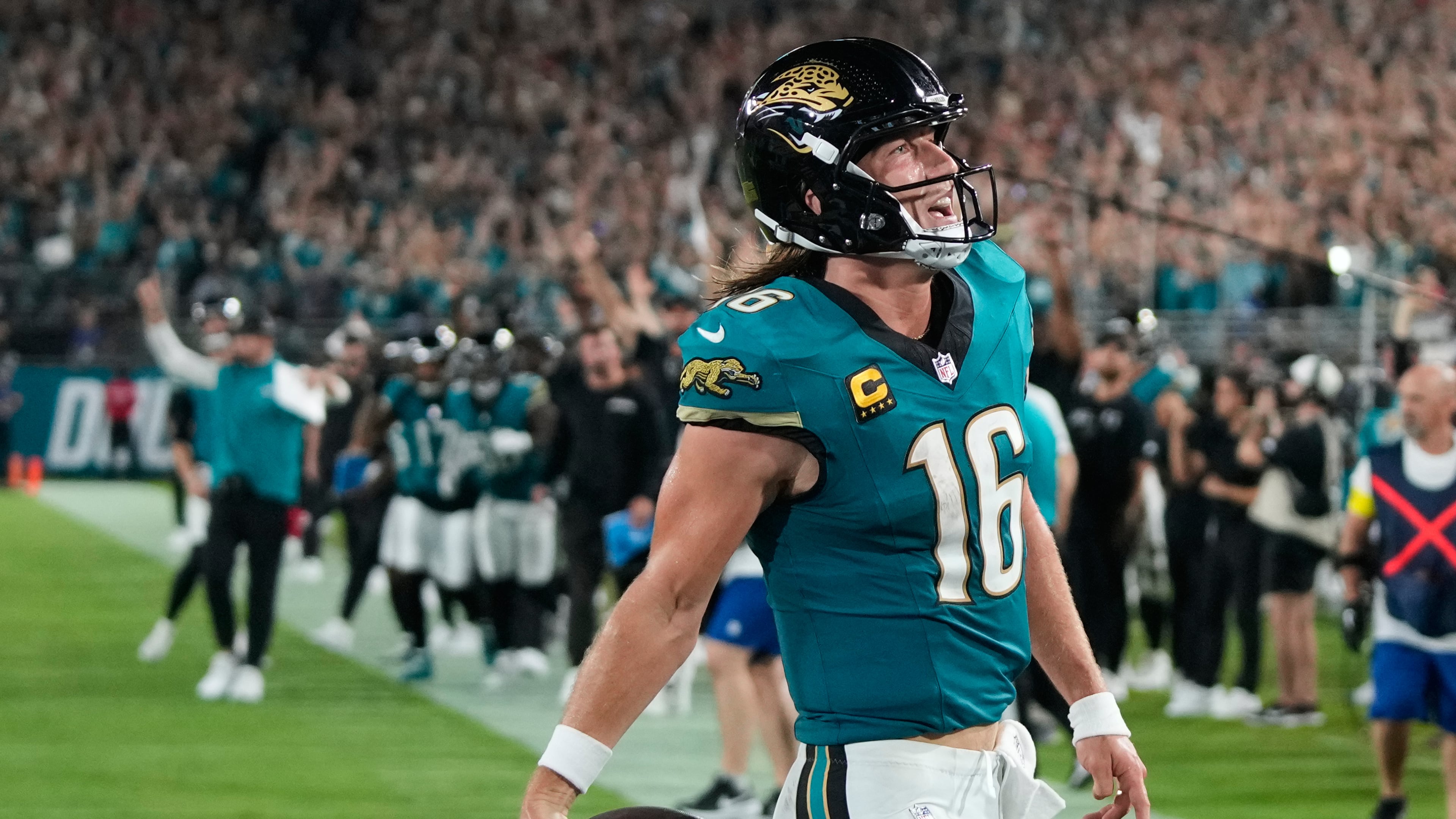 Jacksonville Jaguars quarterback Trevor Lawrence celebrates after scoring a touchdown during the second half of an NFL football game against the Kansas City Chiefs, Monday, Oct. 6, 2025, in Jacksonville, Fla. (AP Photo/John Raoux)
