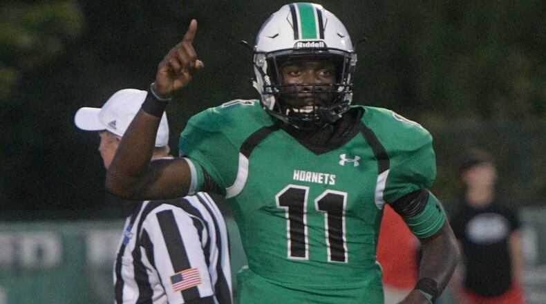 After previously committing to Illinois, a former Roswell High quarterback is joining Lane Kiffin in Boca Raton.