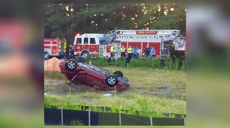 A car crashed into a retention pond Thursday, killing the driver. (Credit: Channel 2 Action News)